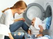 mum and baby doing laundry